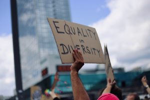 Photo of a protest banner with the words 'equality in diversity'