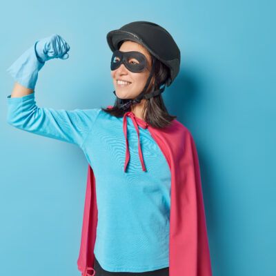 waist up shot of brave positive women superhero fundraiser