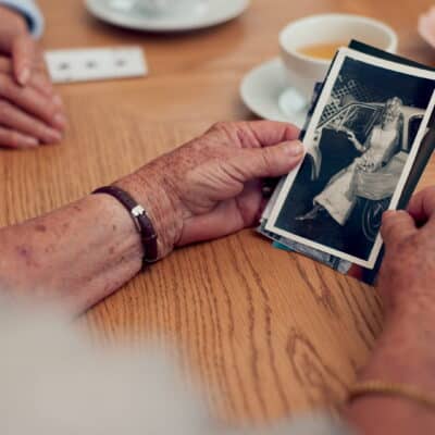 seniors looking at vintage photos