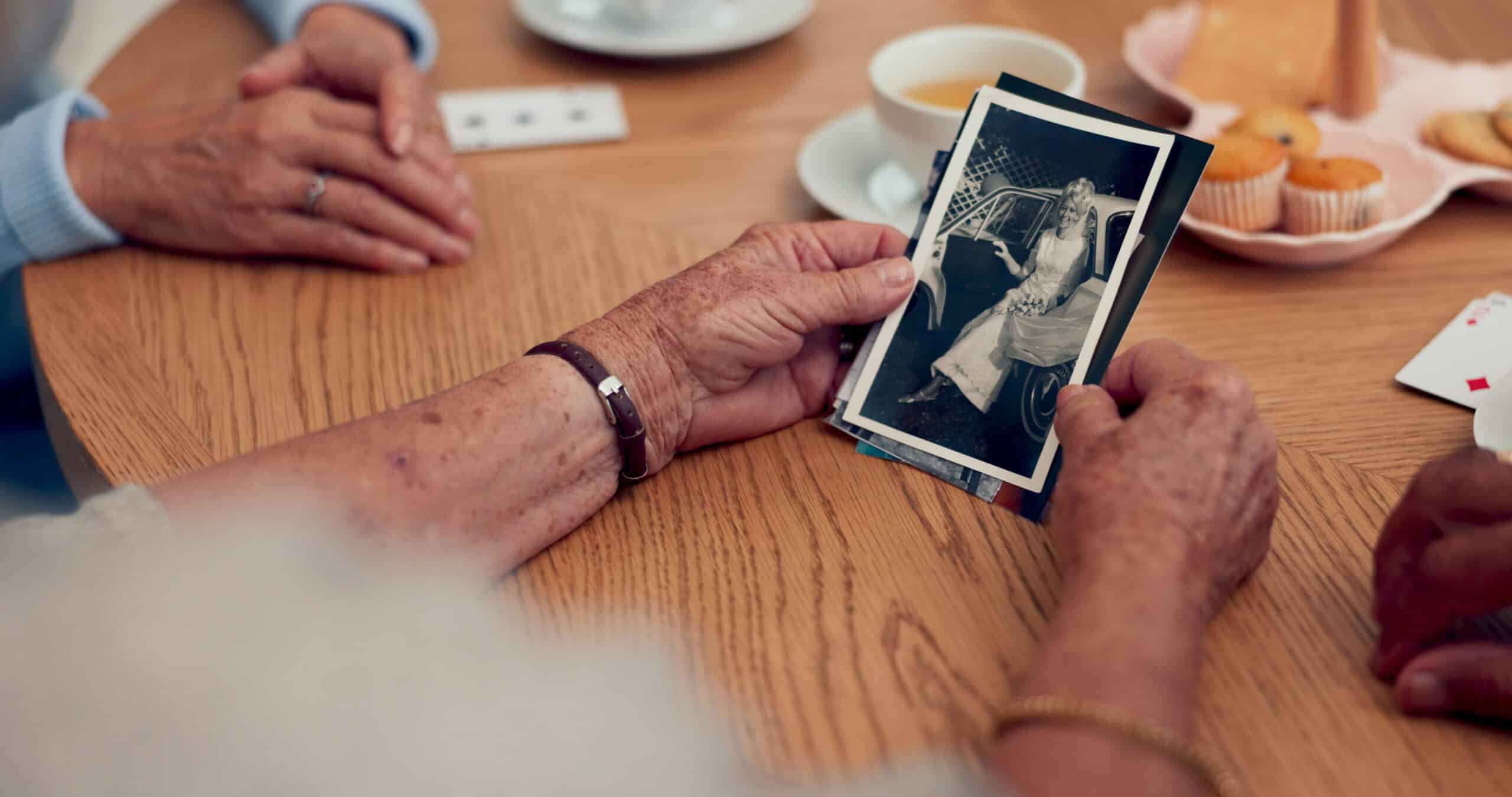 seniors looking at vintage photos